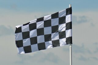Formule 1 - Vlag - Autitravel begeleide vakanties voor mensen met autisme
