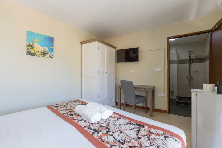 Auti Travel - CuraÃ§ao - begeleide vakanties voor mensen met autisme - Acoya Resort, Villas & Spa slaapkamer voorbeeld
