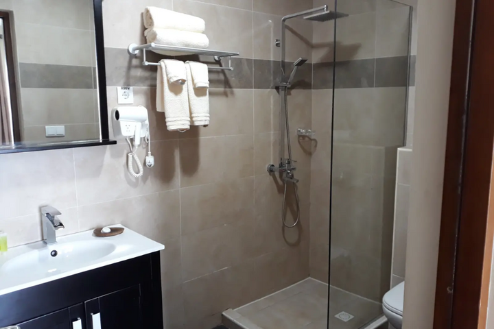 Auti Travel - CuraÃ§ao - begeleide vakanties voor mensen met autisme - Acoya Resort, Villas & Spa badkamer voorbeeld
