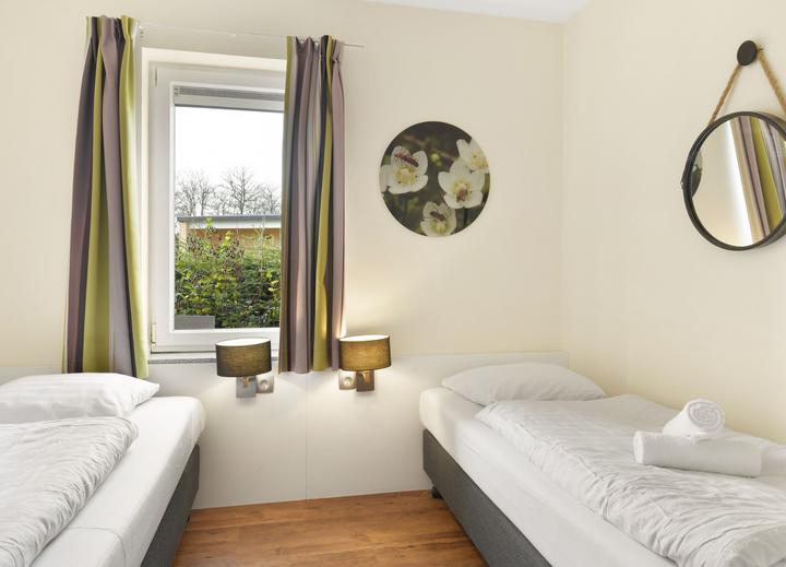 Buitenhof Reizen voor mensen met autisme - Landal Village L’Eau d’Heure - slaapkamer